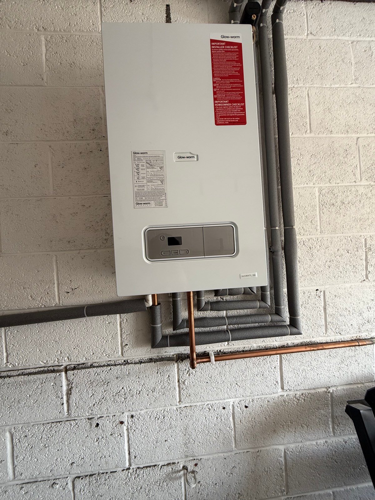 Boiler and insulated pipework installation